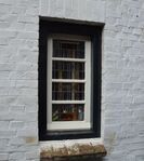 Glas-in-loodraampje aan de achterzijde.
<br/>
Richard Keijzer, 2014-12-09